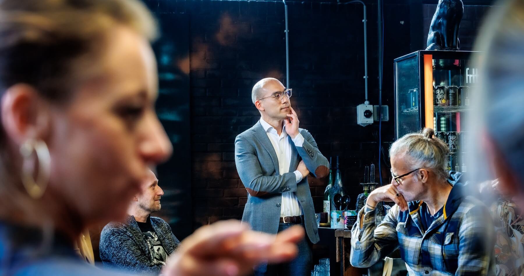 Various members of the Advisory Board in conversation with each other.